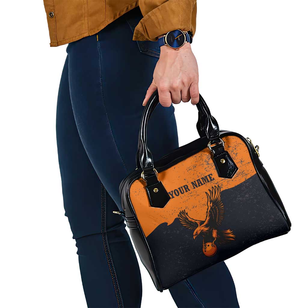 Flying Eagle Carrying Bowling Ball Shoulder Handbag with Grunge Orange and Black Splatter Design TS04